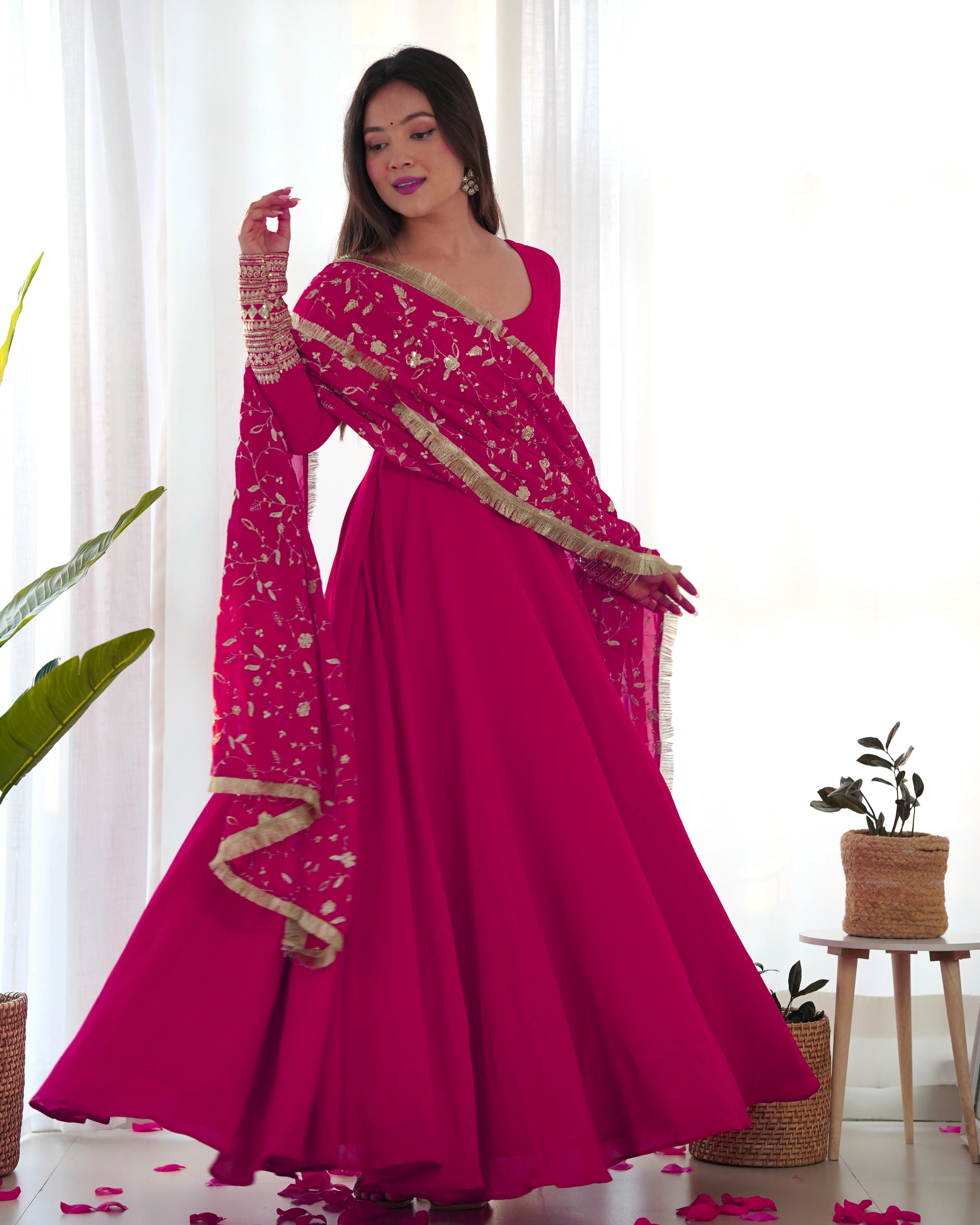 Radiant Rani Pink Anarkali Gown Set with Intricate Lace Dupatta