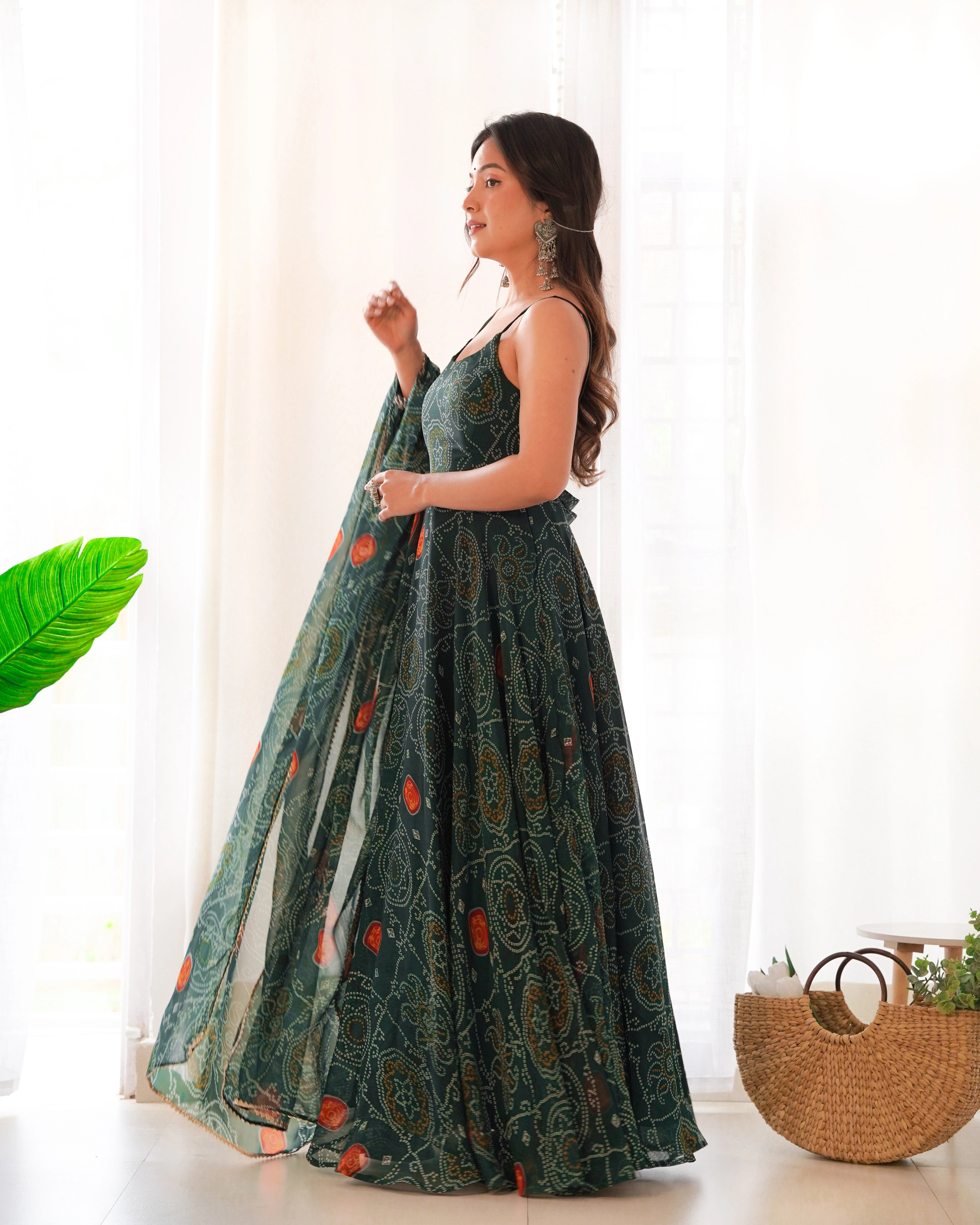 Elegant Dark Green Chiffon Bandhej Gown with Backless Dori Pattern