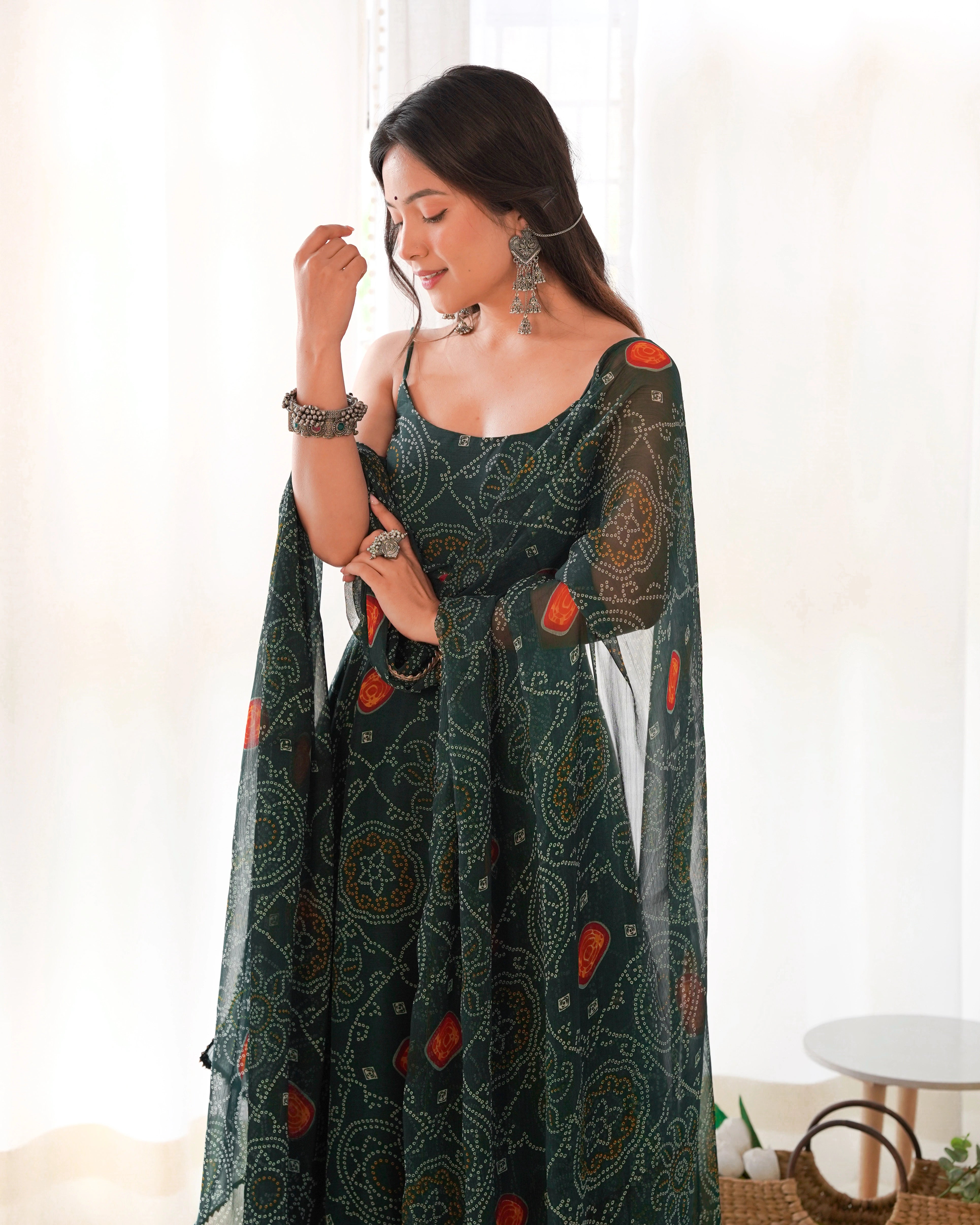 Elegant Dark Green Chiffon Bandhej Gown with Backless Dori Pattern