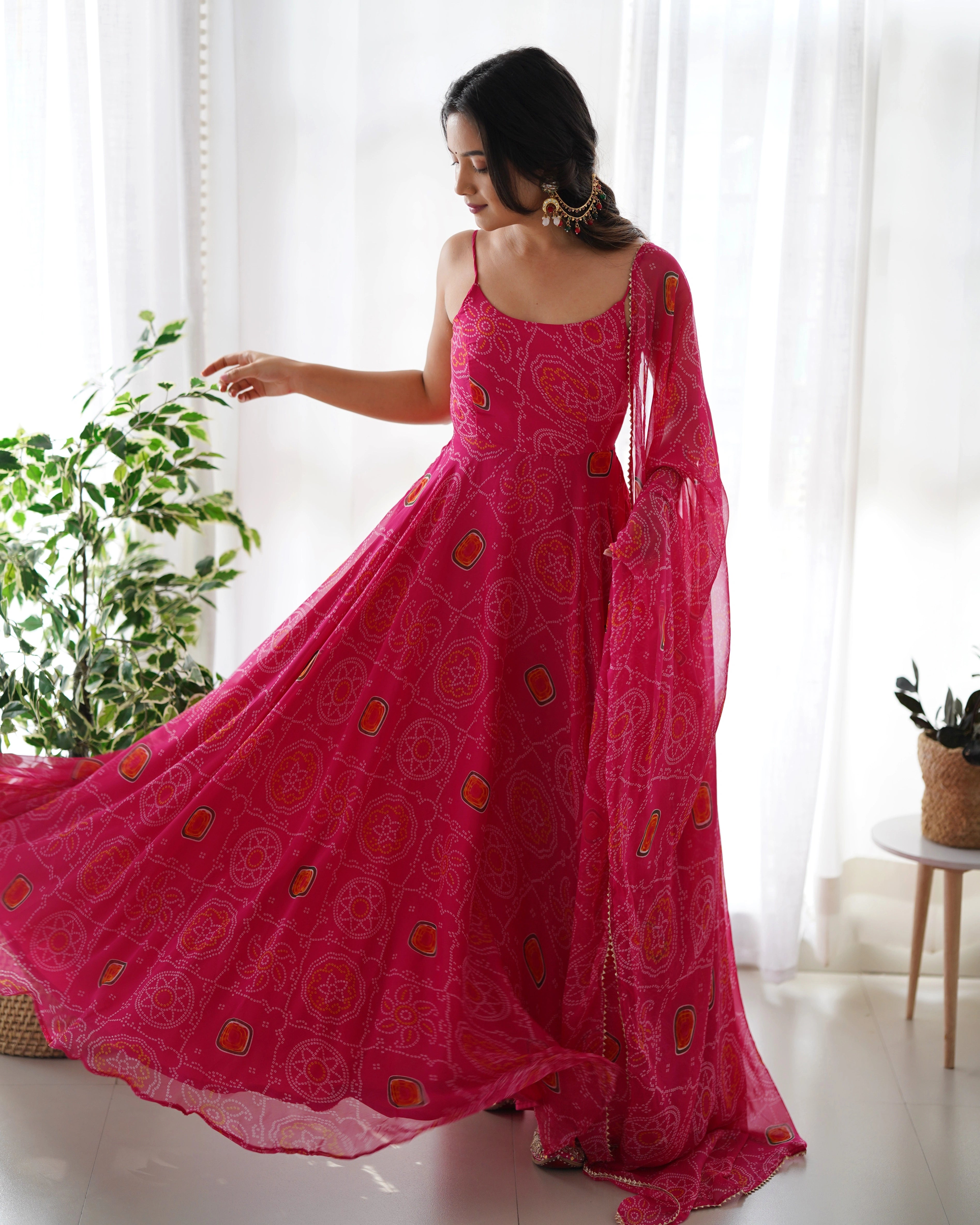 Vibrant Pink Chiffon Bandhej Gown with Intricate Triangle Lace Dupatta