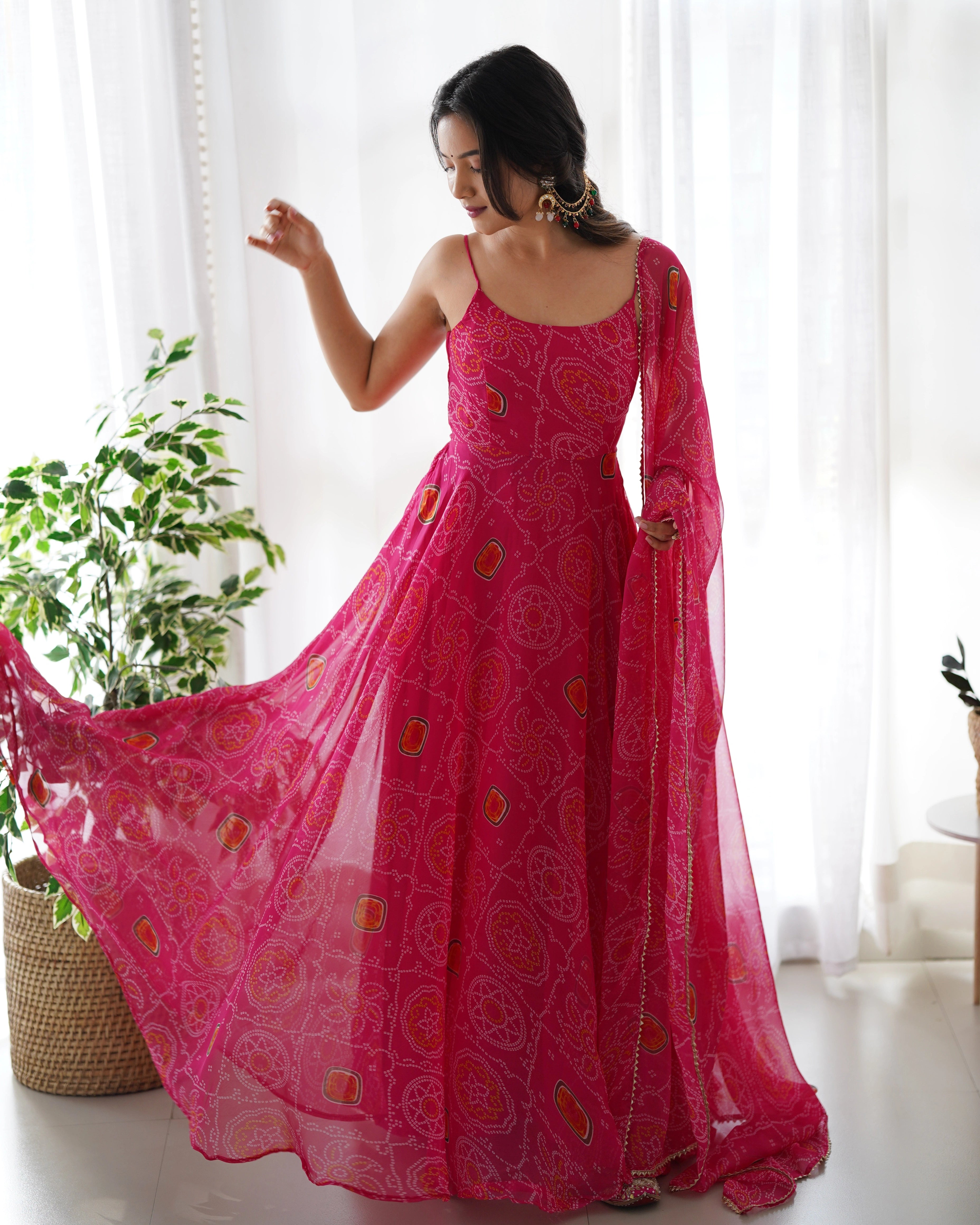 Vibrant Pink Chiffon Bandhej Gown with Intricate Triangle Lace Dupatta