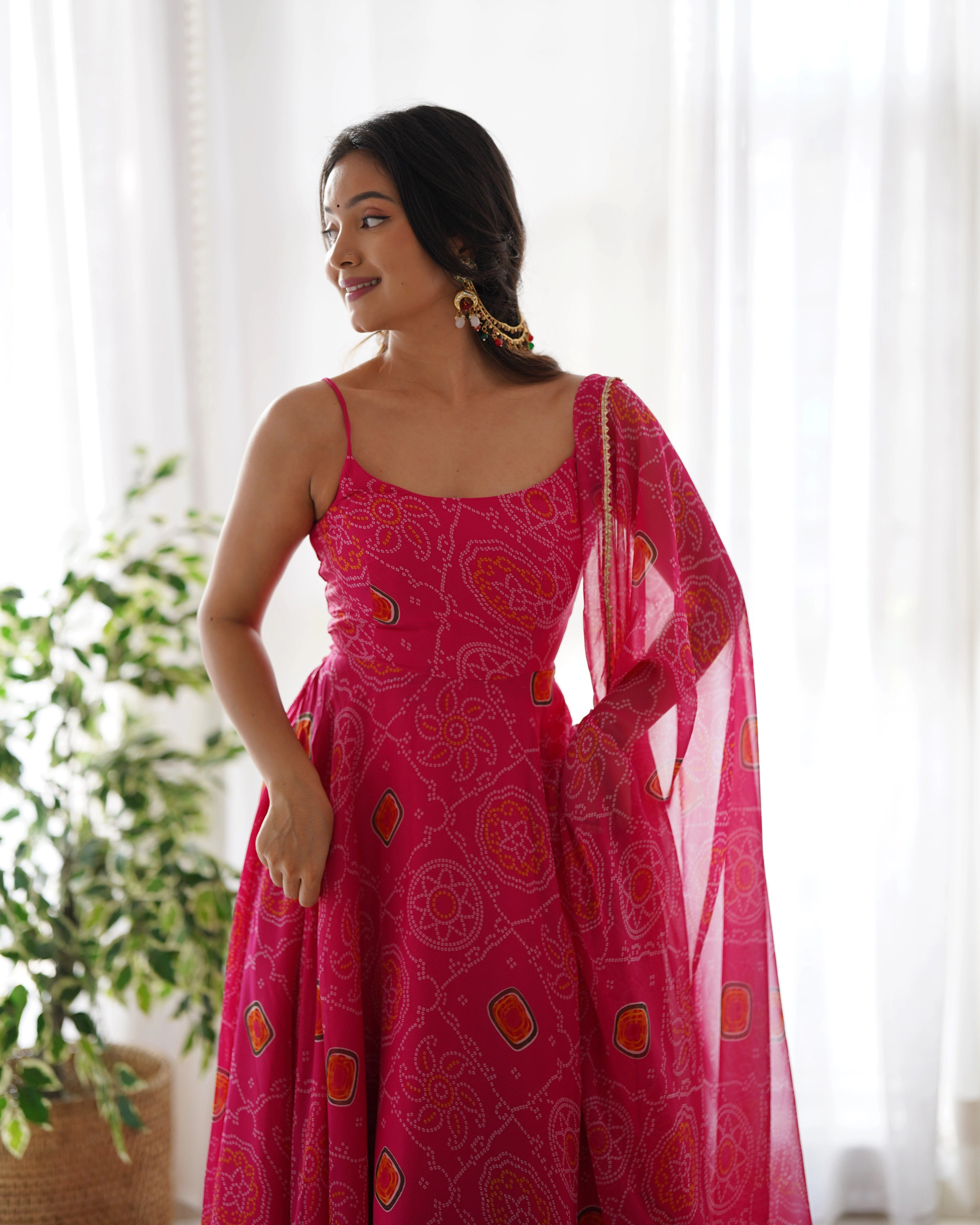 Vibrant Pink Chiffon Bandhej Gown with Intricate Triangle Lace Dupatta