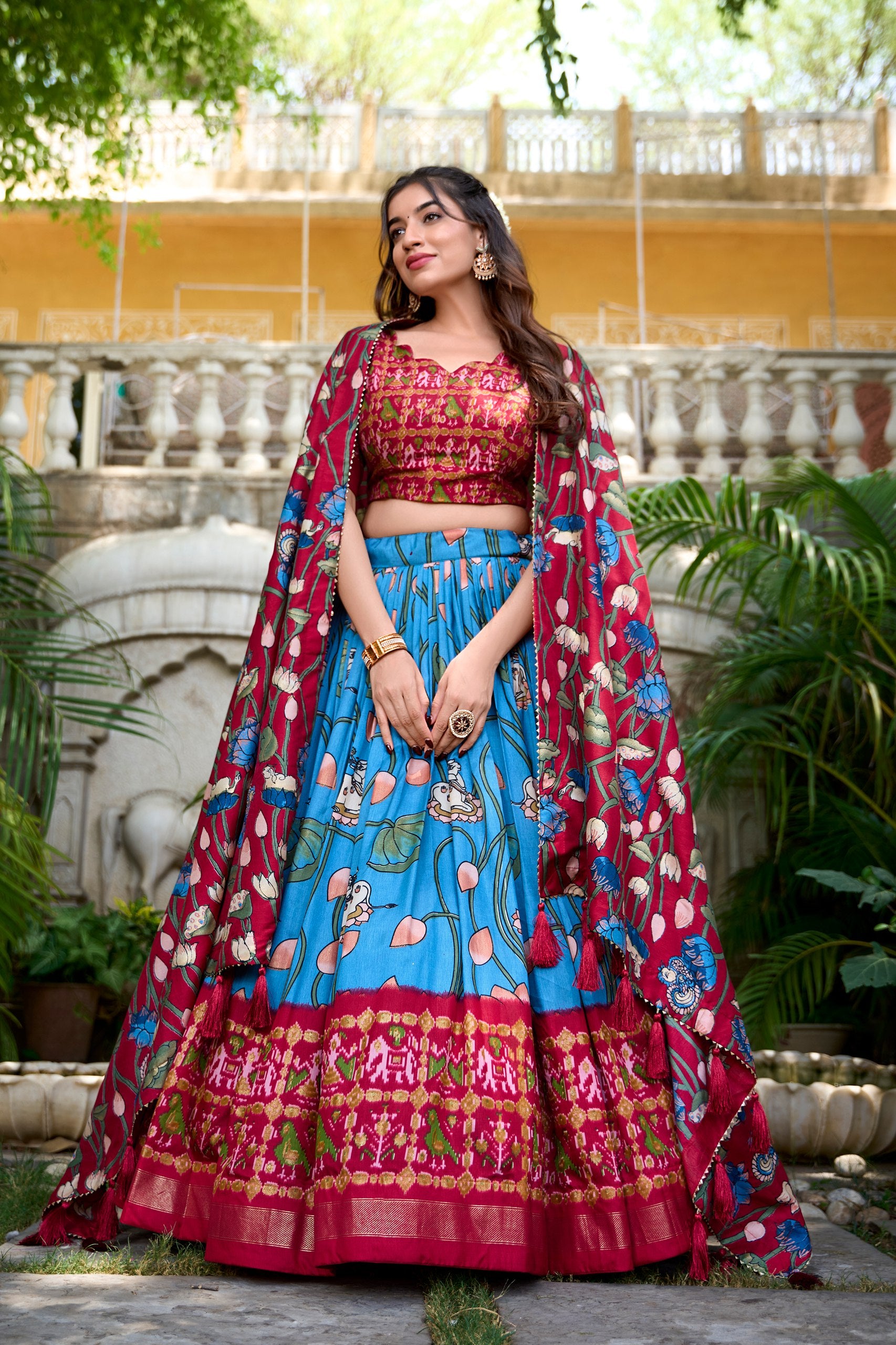 Frosted Rose Tussar Silk Pichwai and Patola Printed Lehenga Choli with Foil Work Border & Tassel Dupatta