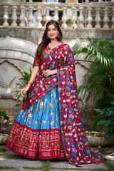 Frosted Rose Tussar Silk Pichwai and Patola Printed Lehenga Choli with Foil Work Border & Tassel Dupatta