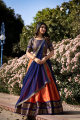 Vibrant Orange and Navy Blue Kanchipuram Silk Lehenga Choli with Lace Border Dupatta