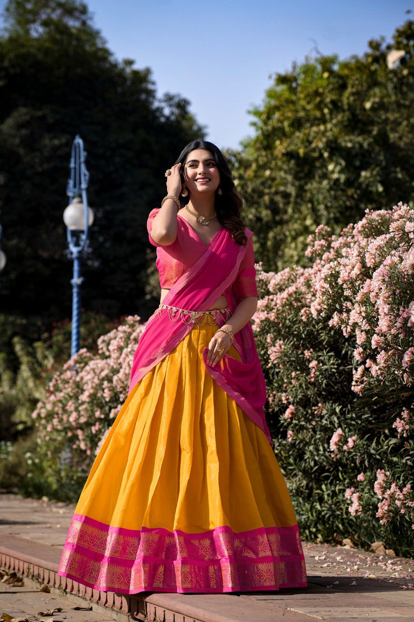 Vibrant Yellow and Pink Kanchipuram Silk Lehenga Choli with Golden Border and Zari Weaving