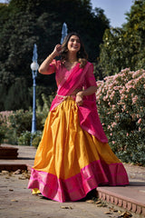 Vibrant Yellow and Pink Kanchipuram Silk Lehenga Choli with Golden Border and Zari Weaving