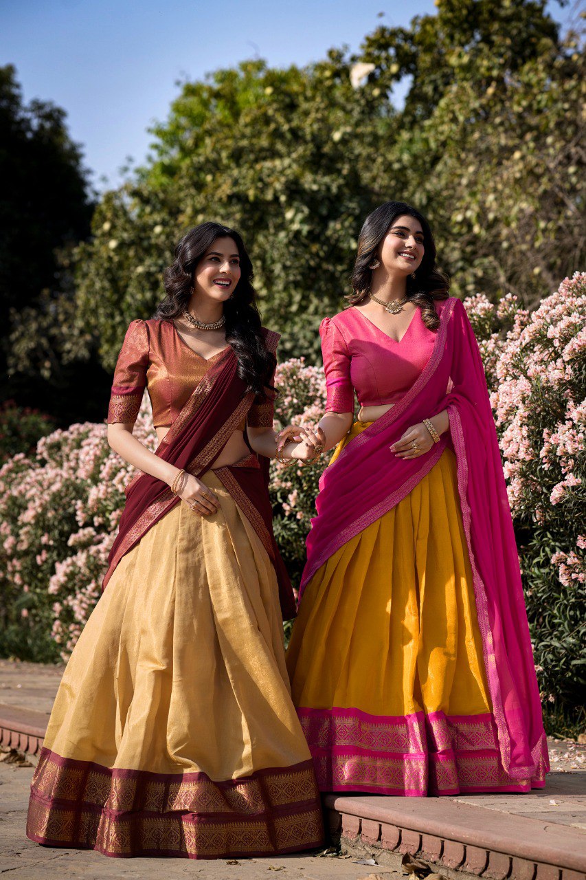 Vibrant Yellow and Pink Kanchipuram Silk Lehenga Choli with Golden Border and Zari Weaving