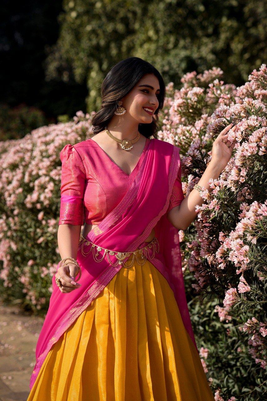 Vibrant Yellow and Pink Kanchipuram Silk Lehenga Choli with Golden Border and Zari Weaving