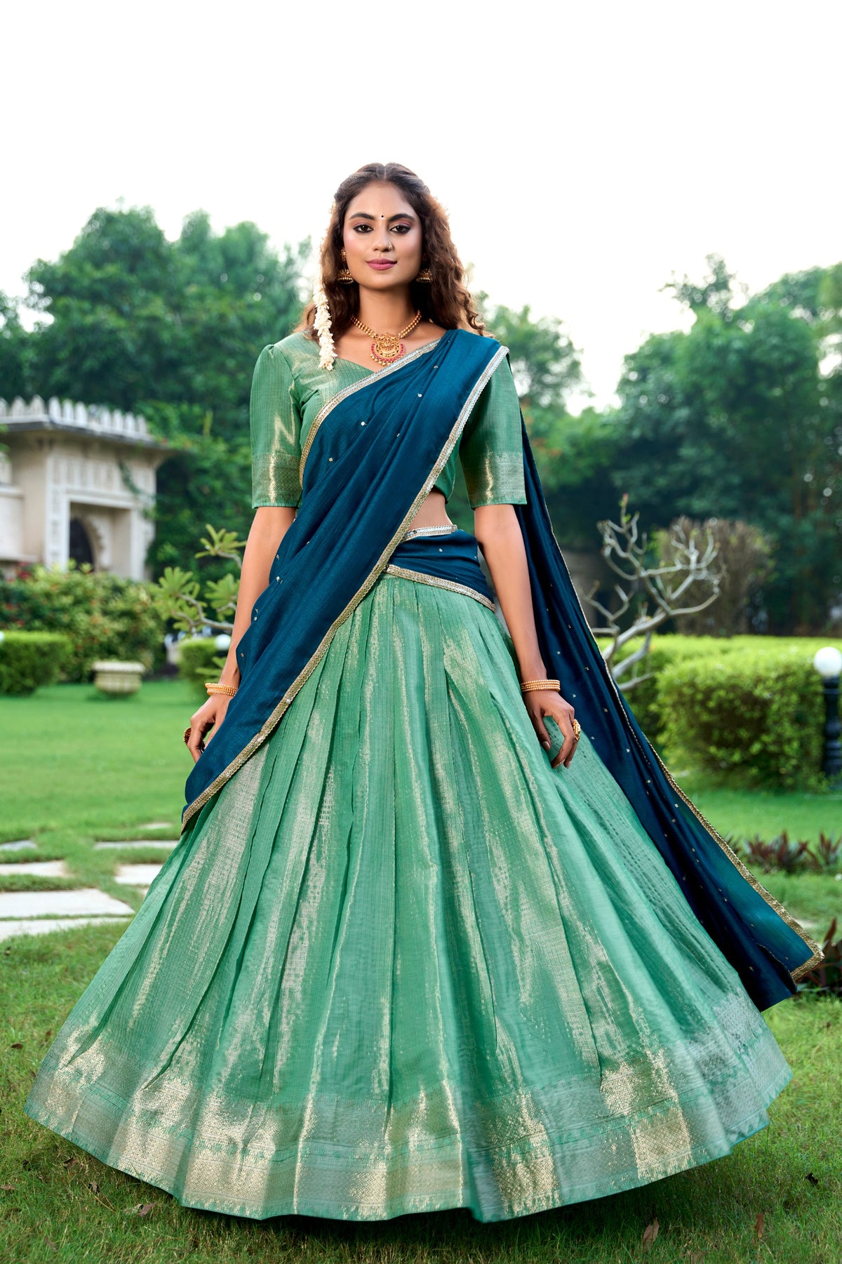 Green Kanchipuram Silk Half Saree with Zari Weaving for Festive Wear