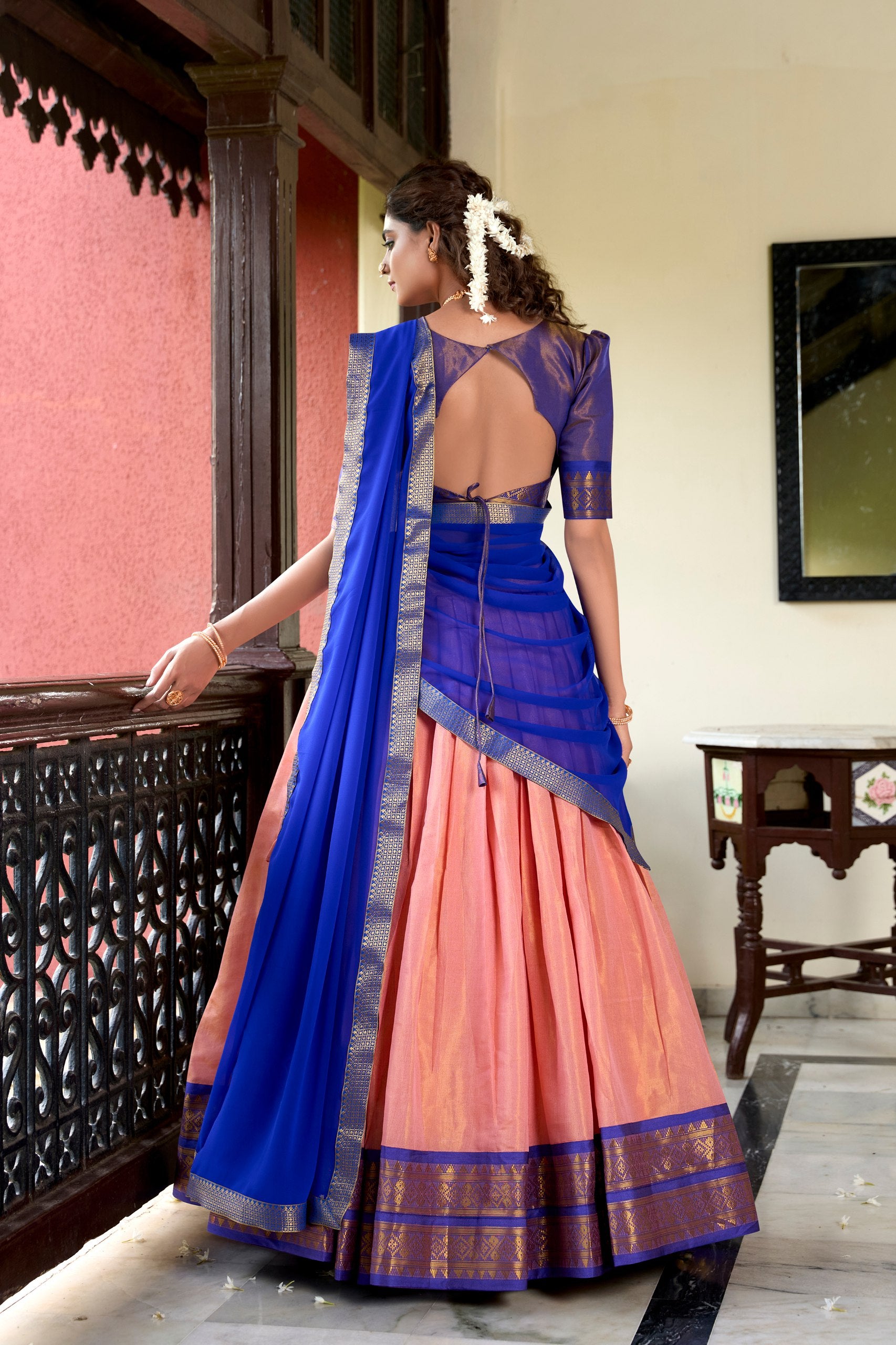 Peach Kanchipuram Silk Lehenga Choli with Zari Weaving and Georgette Dupatta