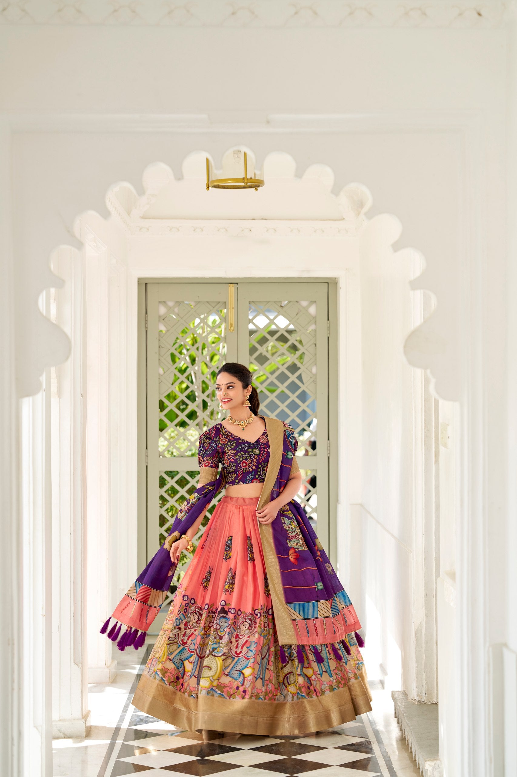 Peach Dola Silk Lehenga Choli with Kalamkari Print and Tassel Dupatta