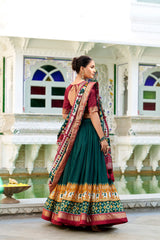 Green Tussar Silk Traditional Lehenga Choli with Heavy Tassels and Canvas Stitching