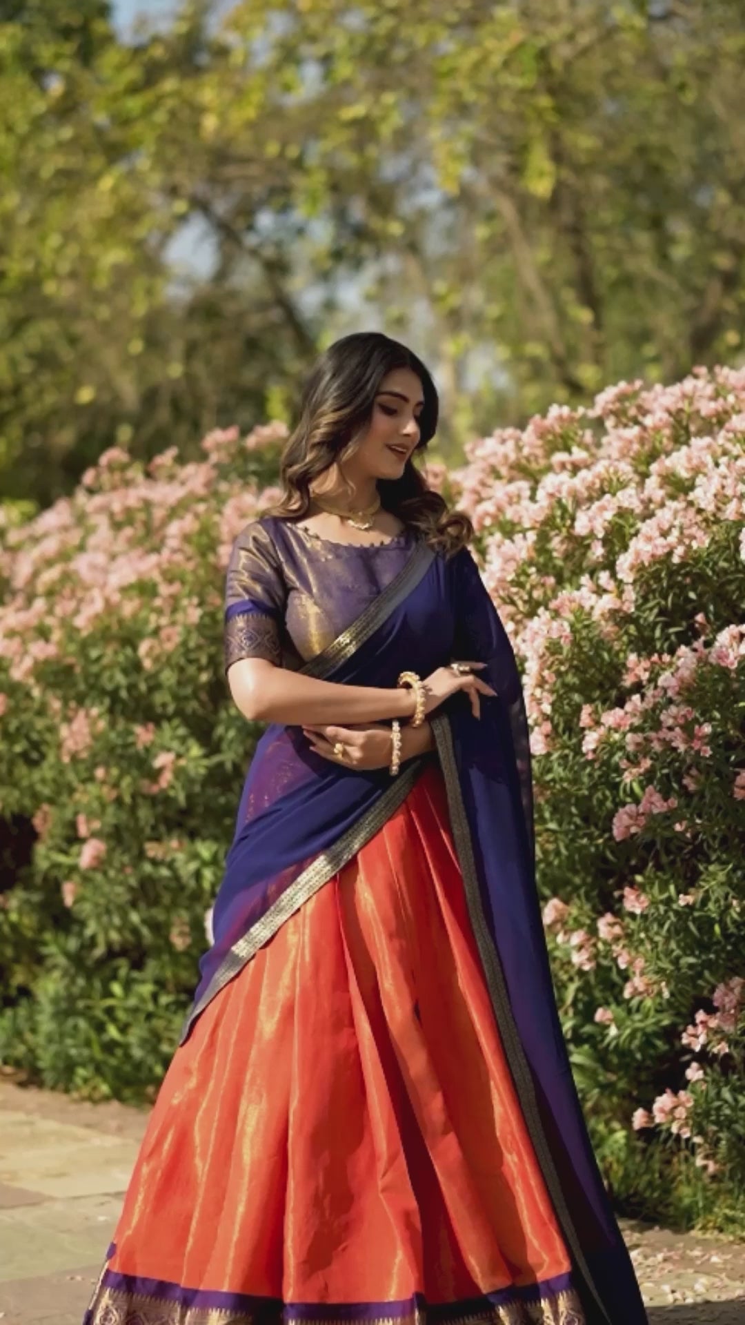 Vibrant Orange and Navy Blue Kanchipuram Silk Lehenga Choli with Lace Border Dupatta